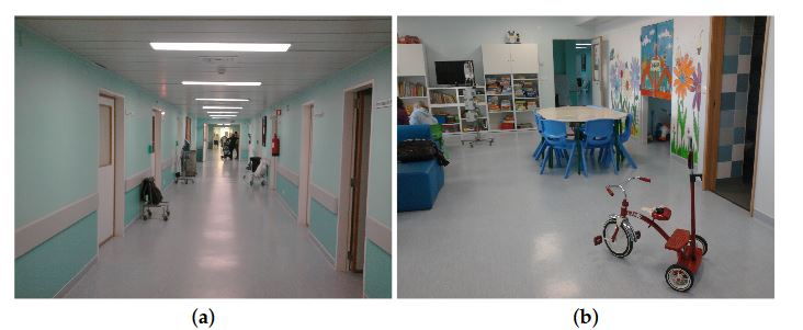 Figure 8. The Instituto Português de Oncologia de Lisboa (IPOLFG) hospital environment. (a) main corridor; (b) playroom