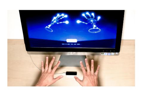 Figure 1: The Leap Motion in use, with onscreen graphic representation of data generated